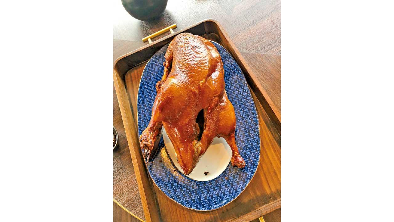 融在舌尖的片皮鴨