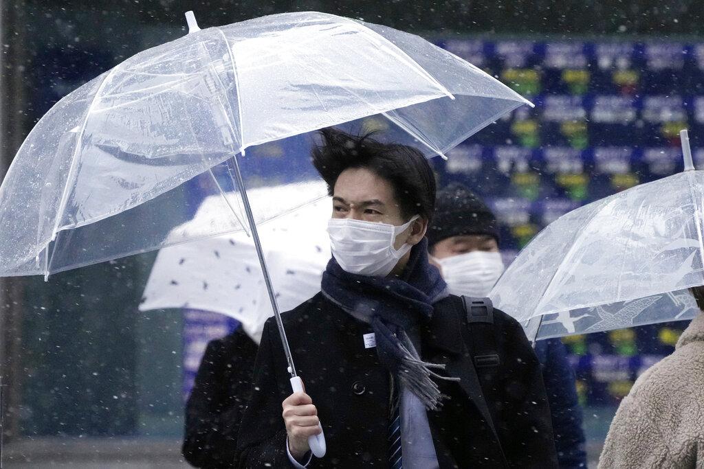 日本7個月以來感染個案首次下跌至1萬以下。(美聯社)