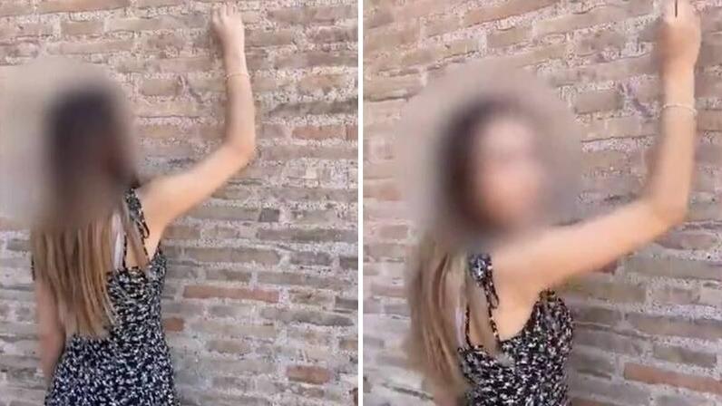 瑞士17歲少女在羅馬鬥獸場磚牆上刻字，被人拍片做證。(互聯網)