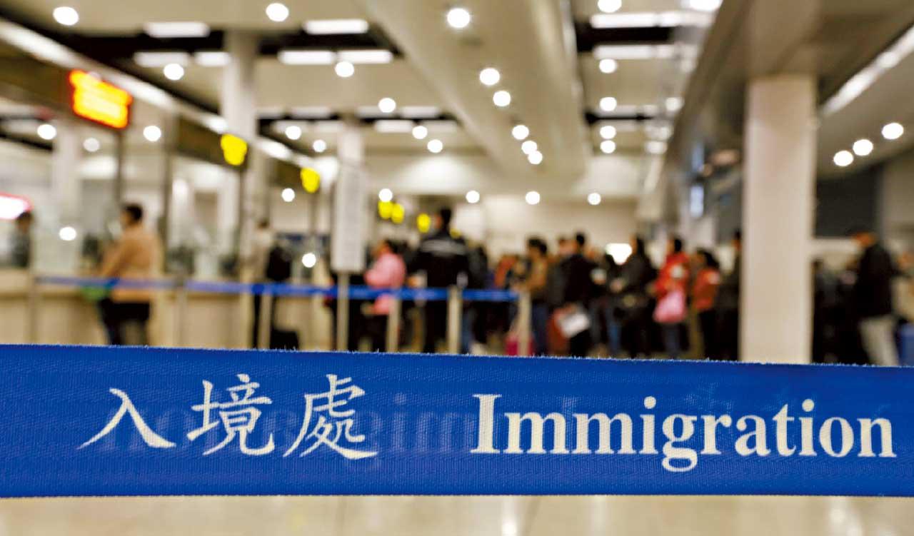 利誘財困青年搵快錢假結婚 2主腦判囚36個月