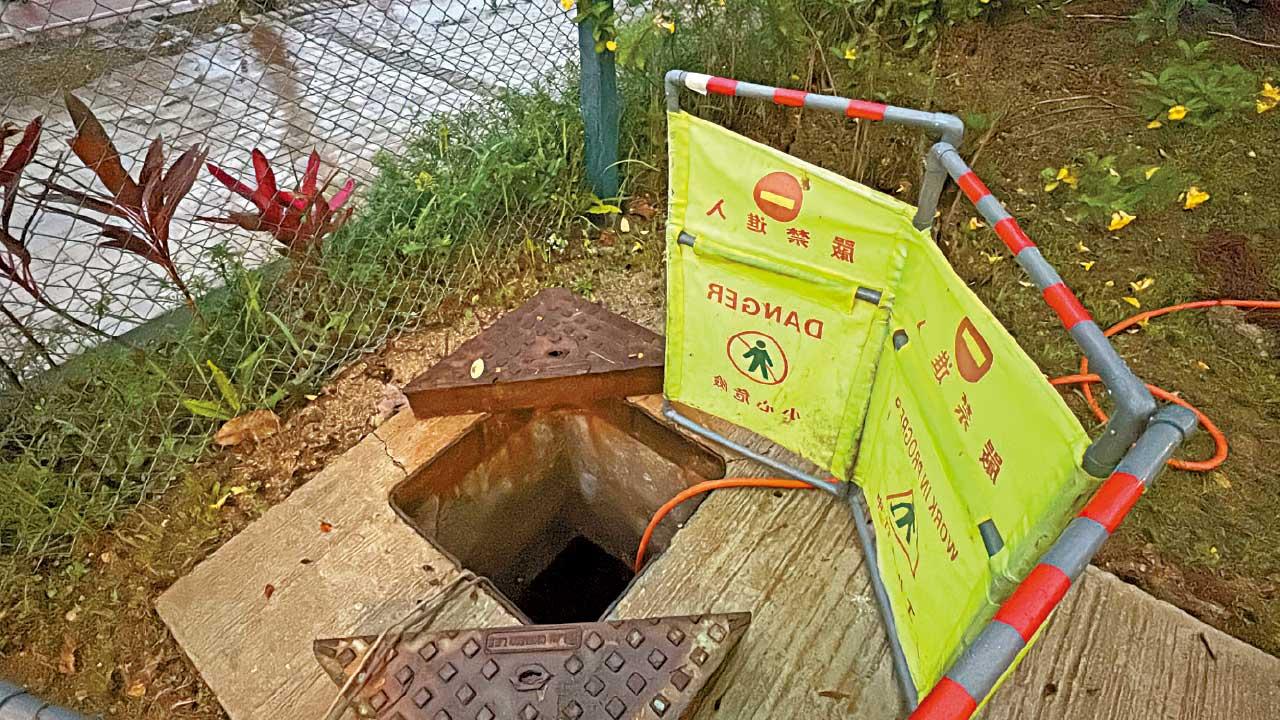 沙田兩工人疑沙井吸沼氣亡 家屬質疑欠職安  渠務署：按程序不需落井  發展局：已暫停承建商投標資格