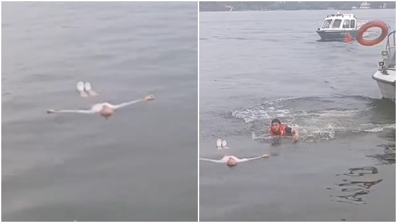 女子失足墮西湖，一個淡定動作成功等到救援。(微博)