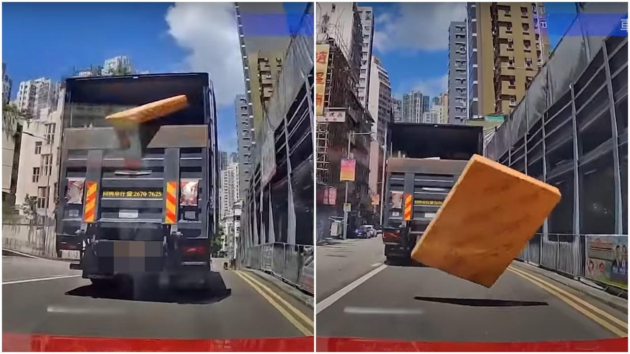 中港牌貨車跌床褥險中的士