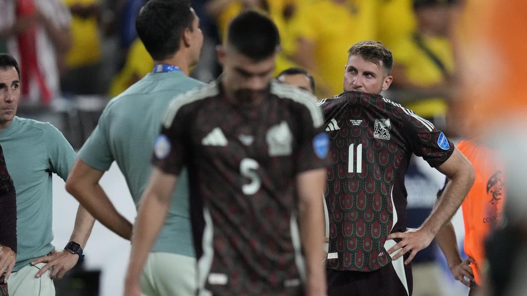 墨西哥只能悶和厄瓜多爾，以得失球差不及對手被淘汰。(美聯社)