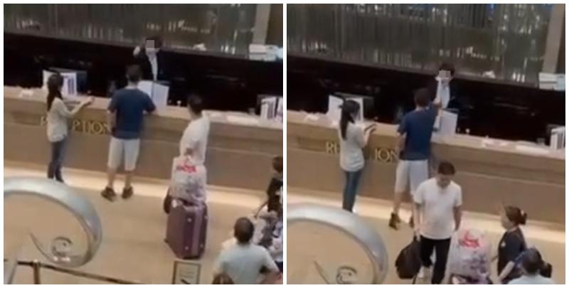 連登討論區流傳影片，指沙田麗豪酒店一名櫃檯男職員與一名男顧客互相以爆粗互罵對方。(影片截圖)