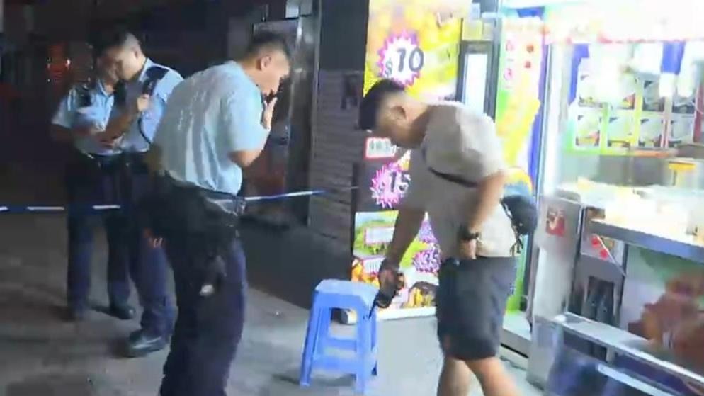 灣仔小食店女店員捱斬，警同日拘3男疑涉金錢糾紛。(電視截圖)