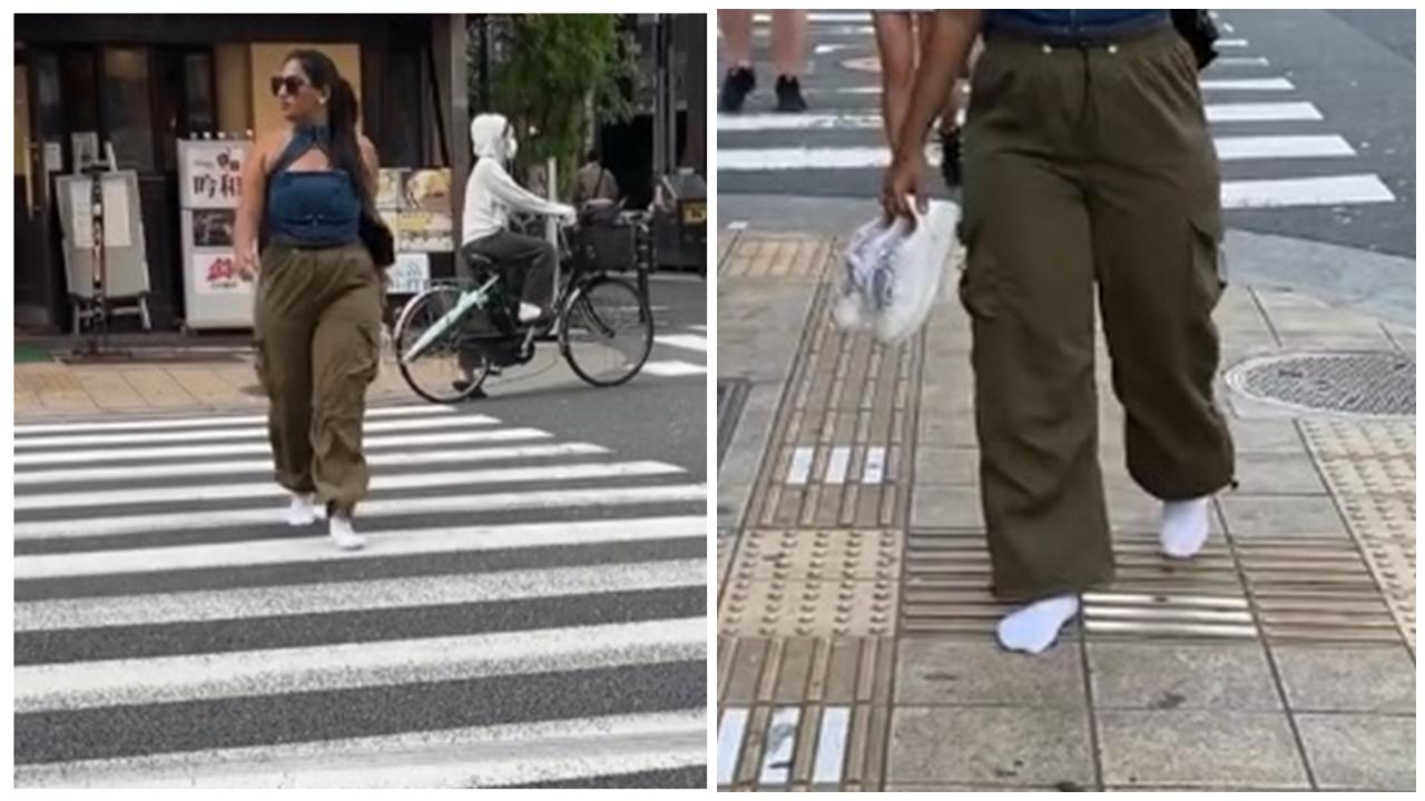 網紅只穿白襪遊走日本街頭，結果震驚網民。(IG)