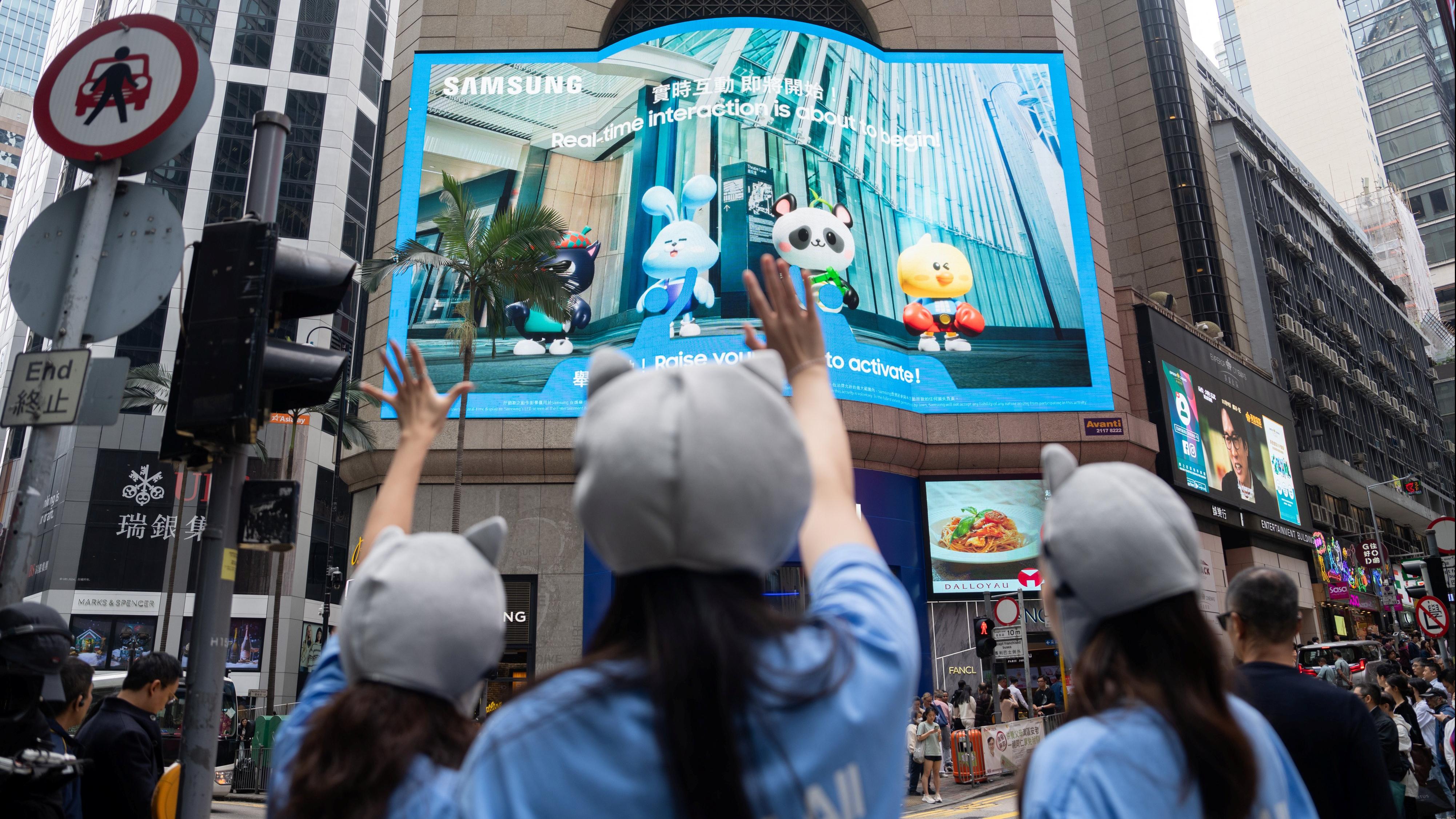 Sica都玩中環實時投影AI互動遊戲　化身Samsung 「AI聯盟」 達文喵