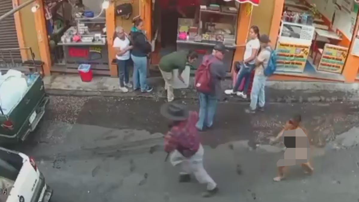 女子裸體街頭奔跑追賊