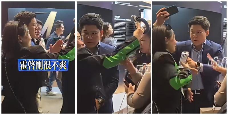 霍啟剛遇到多名人士死纏強行自拍阻擋去路，行為過火，令霍啟剛罕有一度黑面，向對方解釋之後仍不得不合影。(影片截圖)
