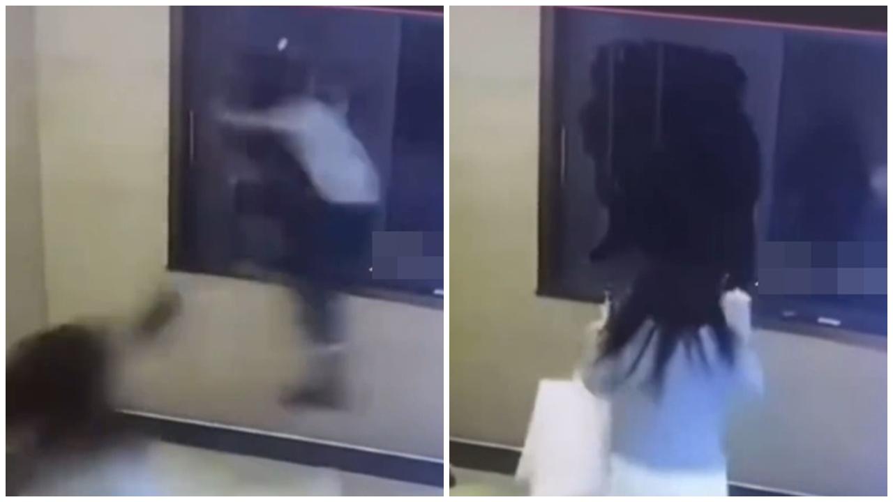 情侶吵架男子撞爆玻璃跳窗嚇壞人，另一視覺曝光遭網民嘲笑。(微博)
