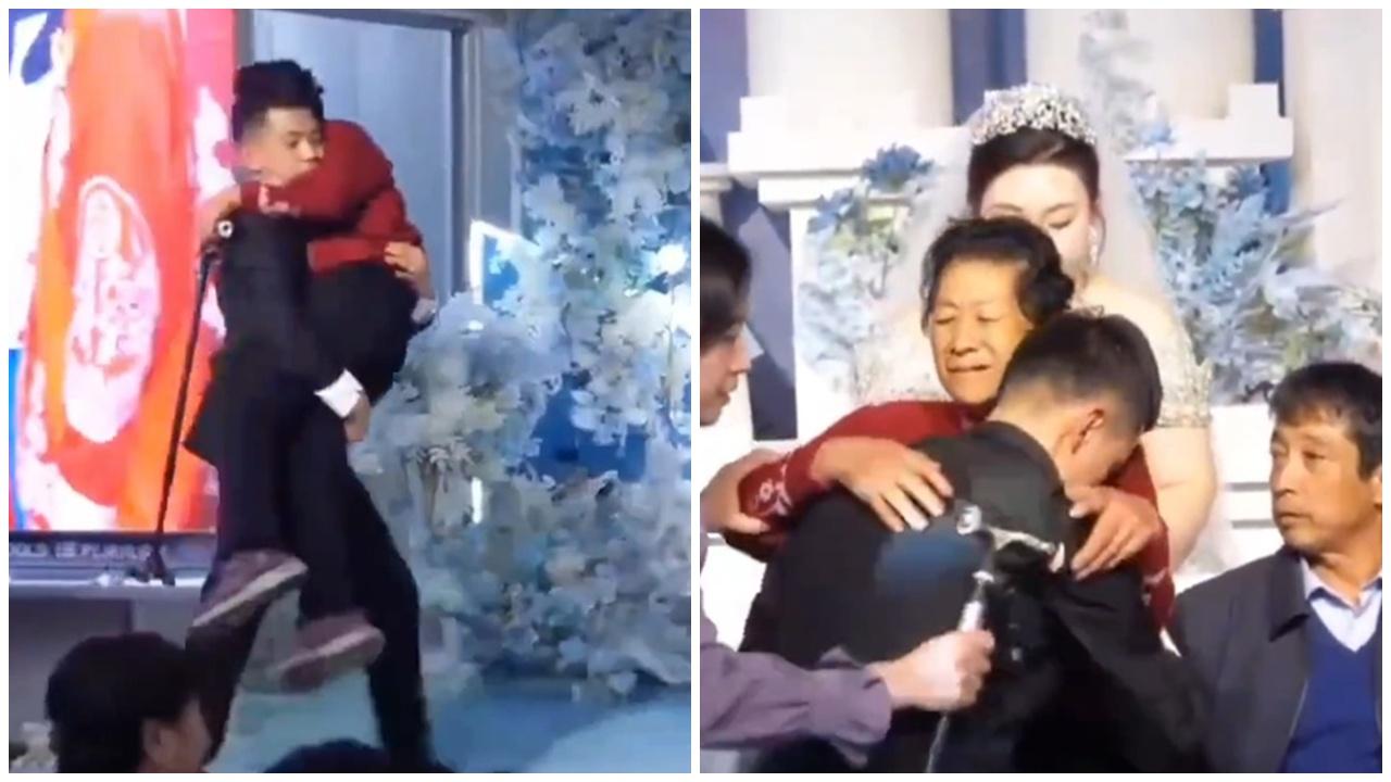  婚禮上殘疾母拒上台合照怕丟兒子臉，新郎抱上台令人動容。(微博)
