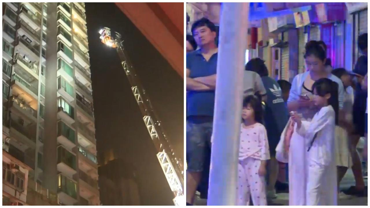 深水埗「喜居」起火傳爆炸聲，男子飛墮平台不治。(有線新聞截圖)