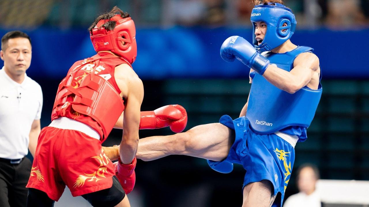 成都世界運動會｜散打張溢霖力戰摘銀 香港隊今屆第5面獎牌。（港協暨奧委會提供）