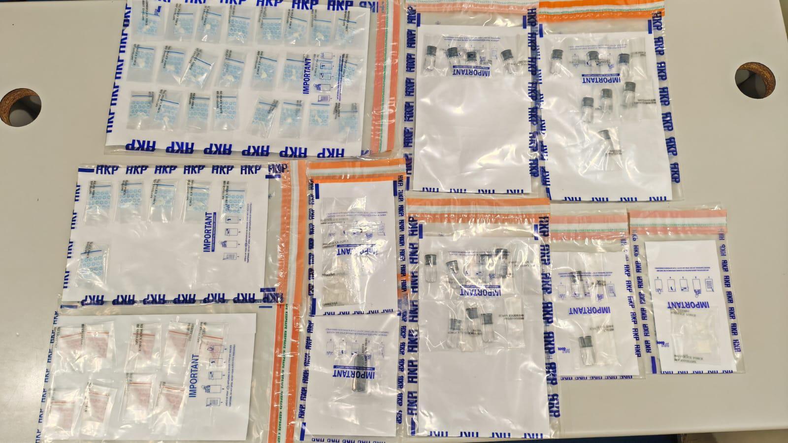 警中區掃毒檢4萬元依托咪酯及霹靂可卡因，兩男女被捕。(警方圖片)