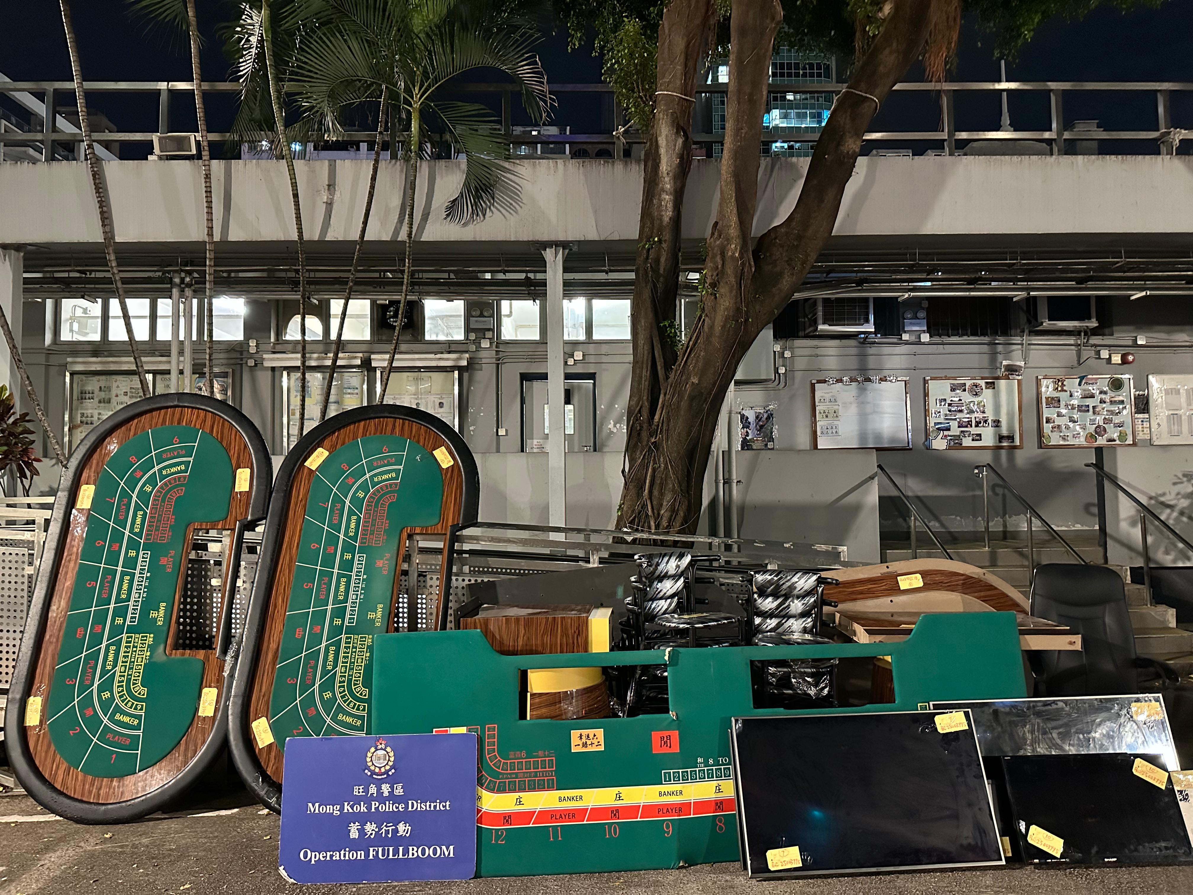 警搗彌敦道非法賭檔拘19人，包括10內地男女。(警方圖片)