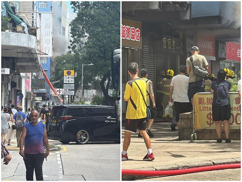 深水埗兩餸飯店火警噴黑煙，消防開喉救熄。(車cam L（香港群組）)
