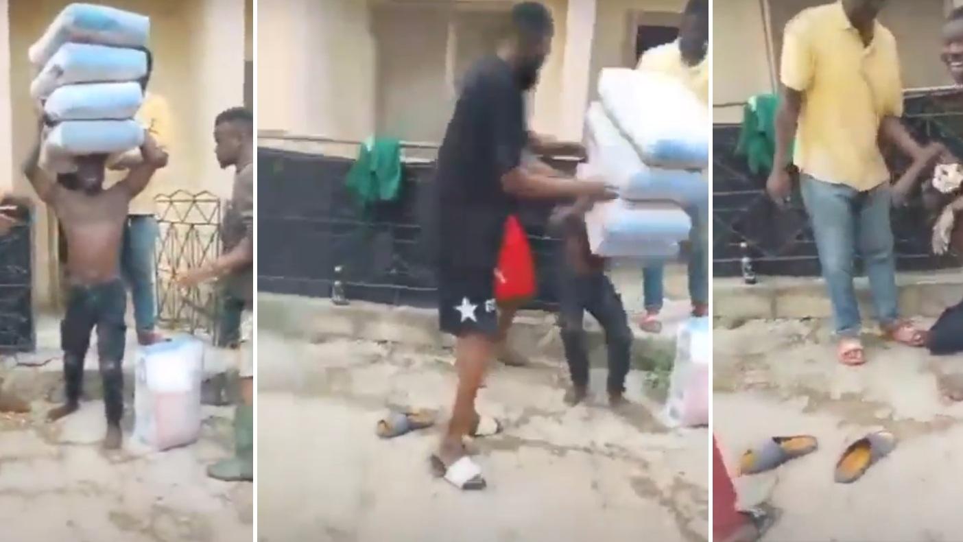 男子頭頂4袋水泥，扛起一兩秒就跪坐倒地，十分驚嚇。(互聯網)