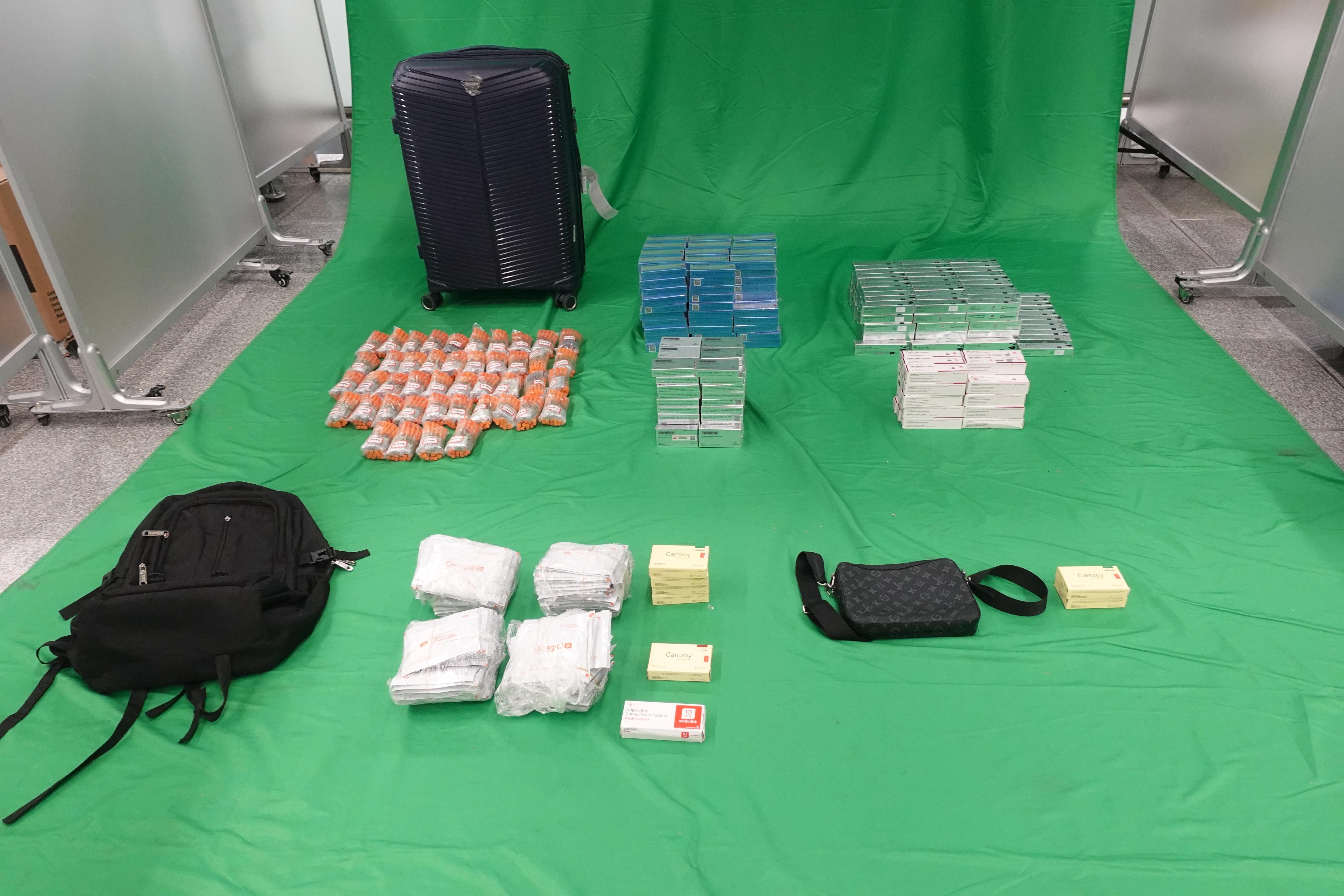 圖示檢獲的藥物針劑、藥劑產品及藥膏。(政府新聞處)