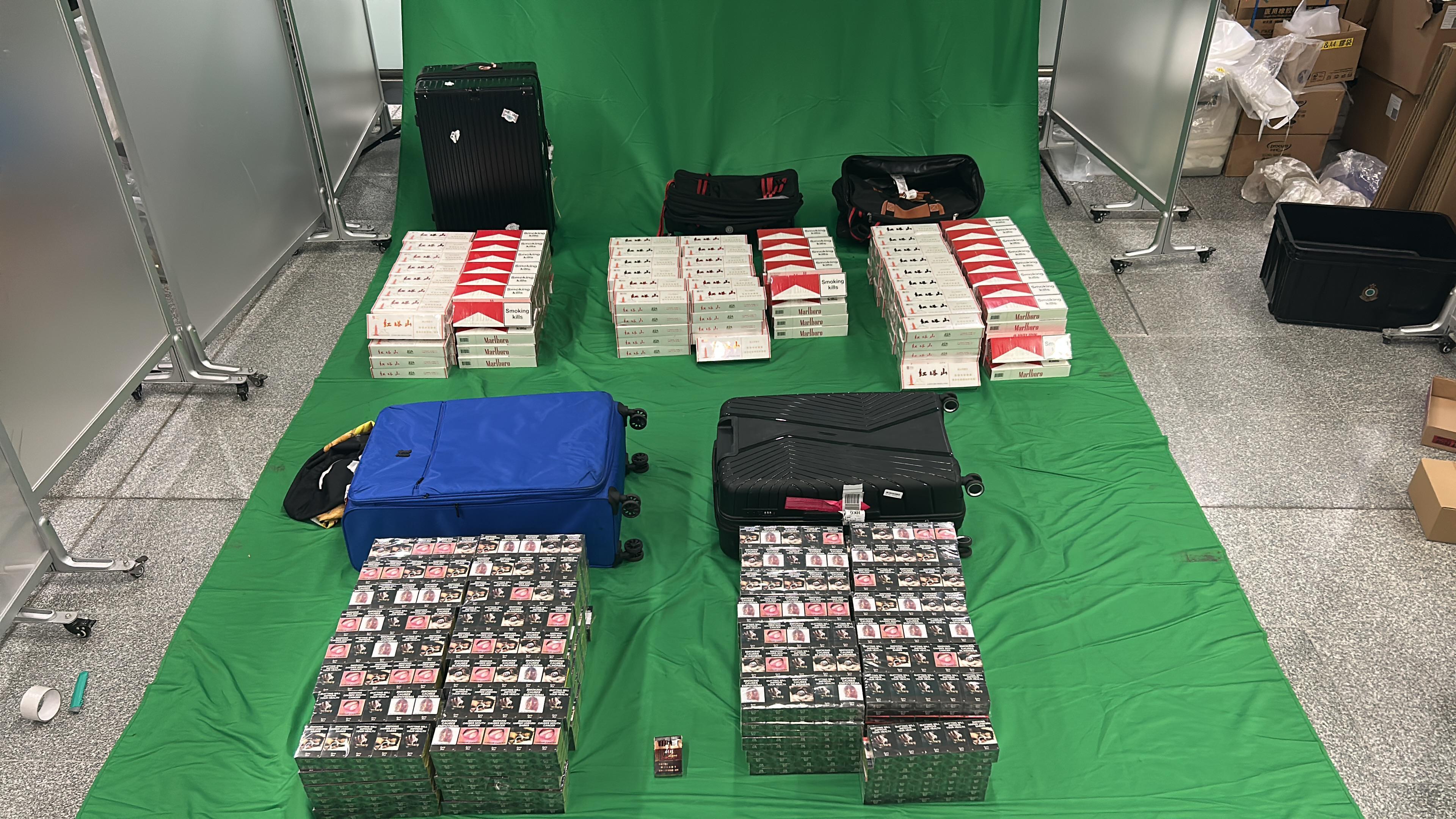 39歲男旅客攜32.8萬元私煙入境，判囚9個月兼罰款1000元。(政府新聞處)