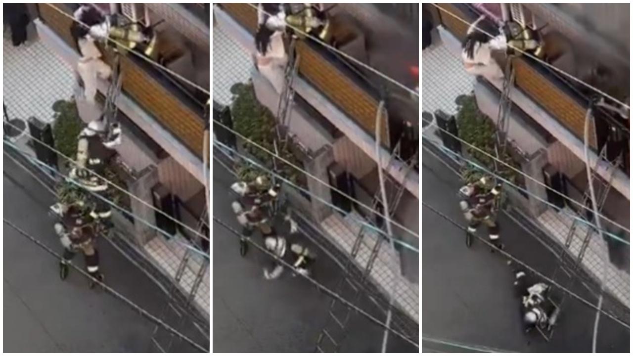 女子火場受困疑過度驚恐，一腳將消防員踢落雲梯。(X)