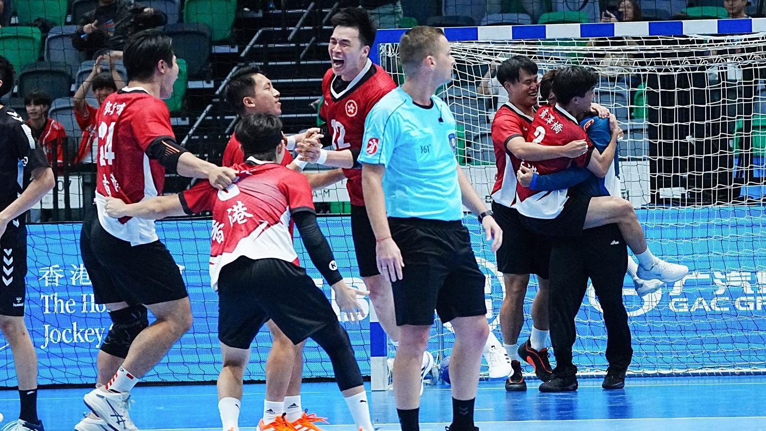 香港手球隊在八強擊敗廣東。(新華社)