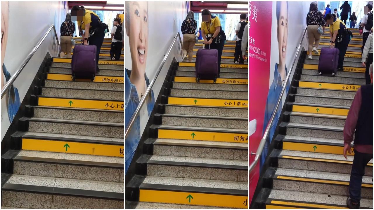 網上熱話｜港鐵職員幫拉行李箱上樓梯　引網民斥責　港鐵：乘客手部不適