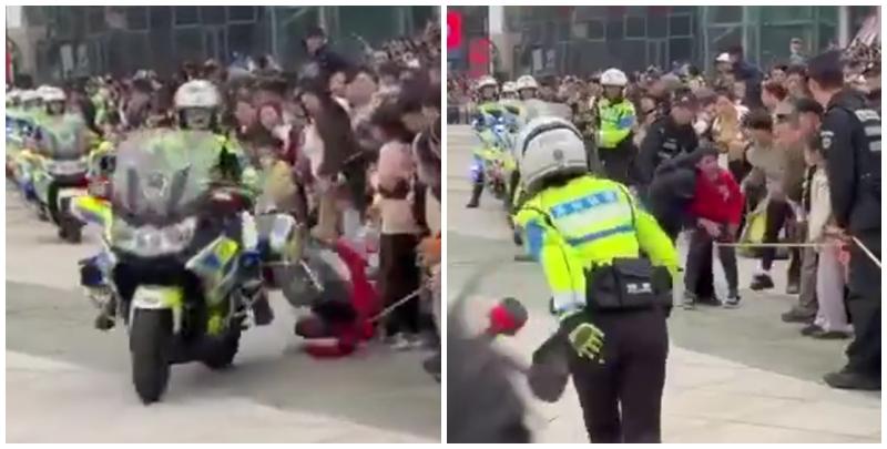 江蘇蘇州公安局一名女交通警駕鐵騎表演期間，失控撞上人群，惟事發後女交警只顧查看車輛受損狀況，及找同僚協助扶正車輛，未前往被撞小孩了解傷勢，惹來網民狠批。蘇州市公安局交通管理局誠懇致歉。(影片截圖)