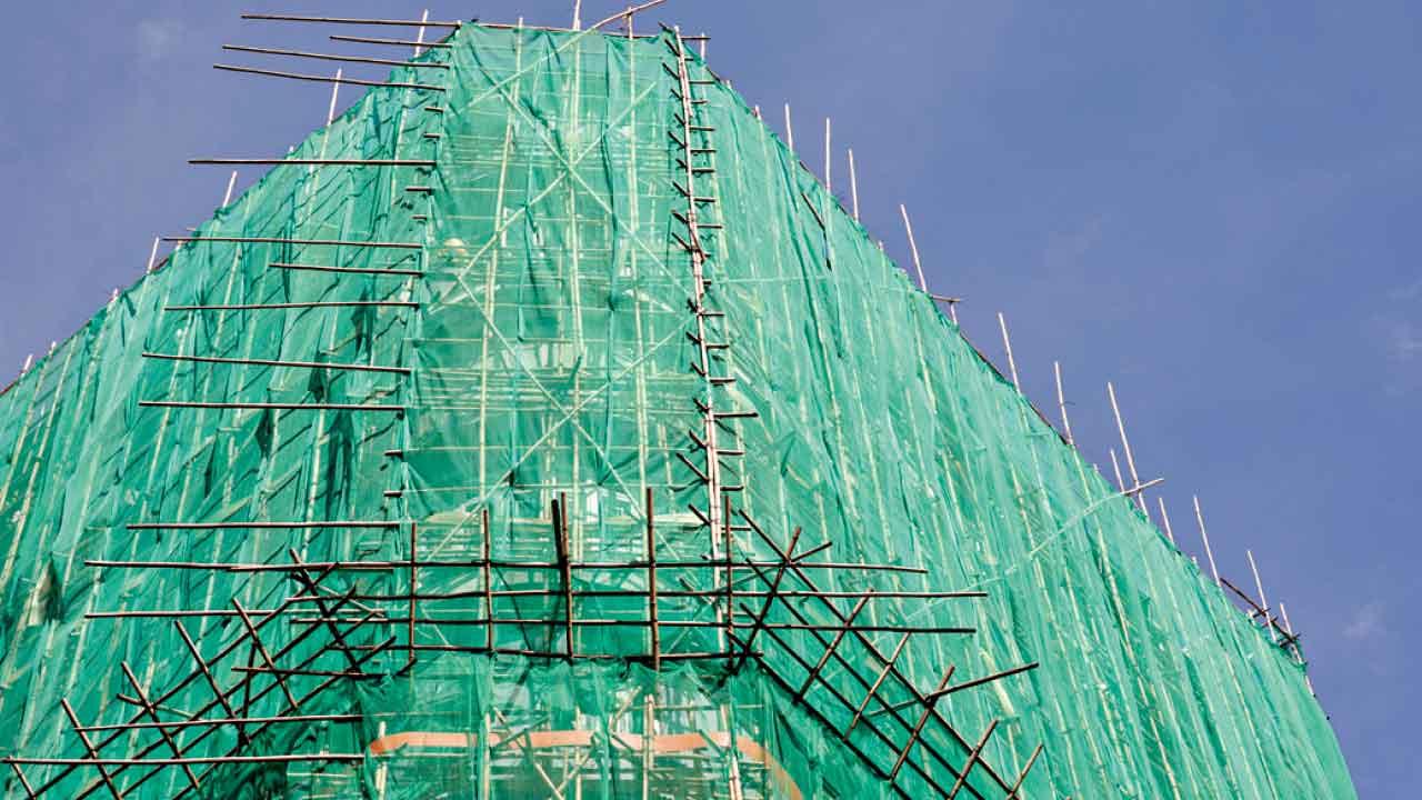 介入樓宇維修：比較制度取代涅槃方法