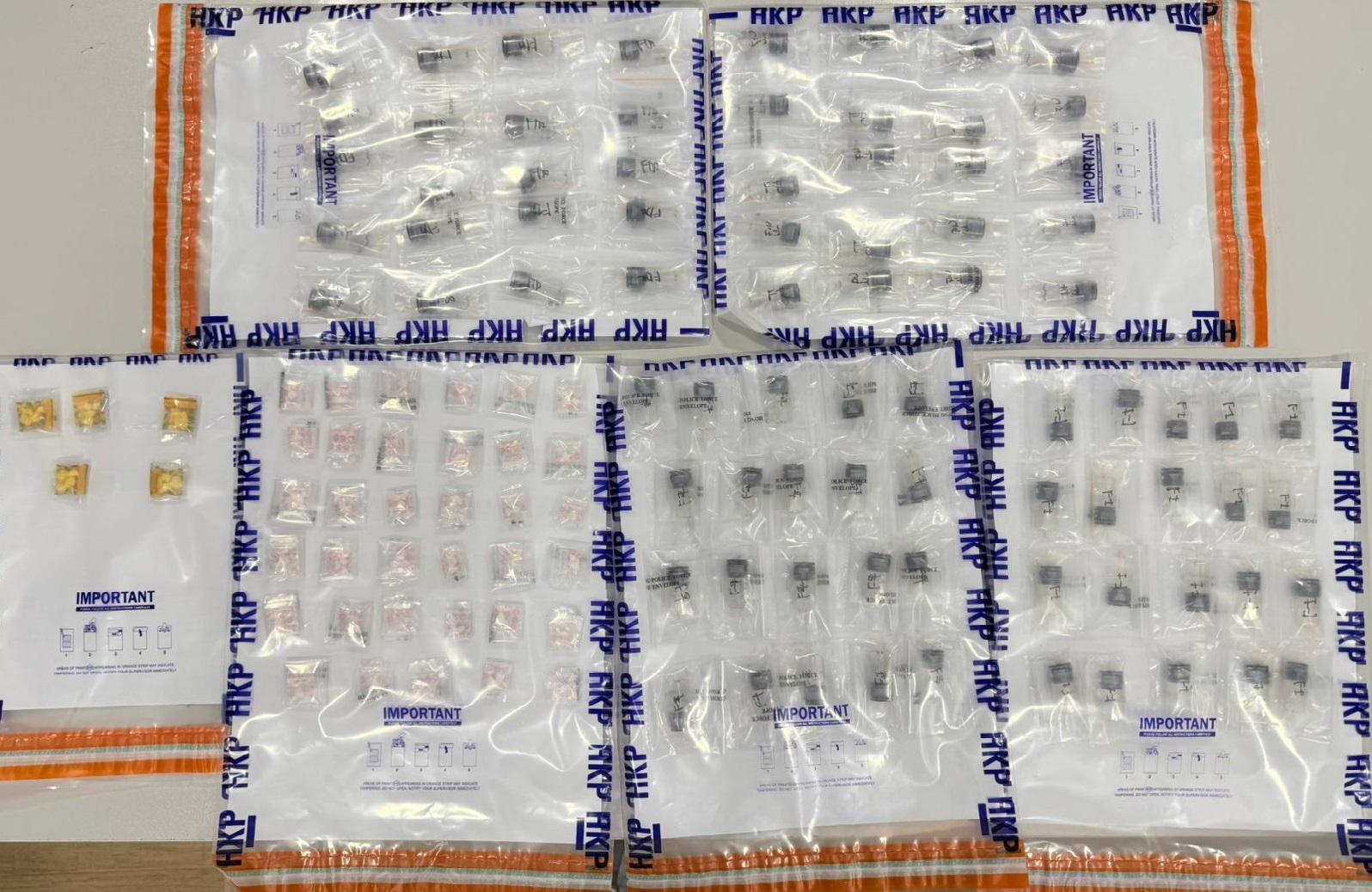 警深水埗富昌邨截可疑男，揭身藏4.9萬元依托咪酯煙彈等被捕。(警方圖片)