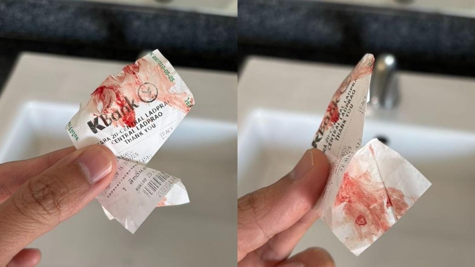 班克情急之下用身上的銀行轉帳單擦拭手臂上的血漬。(互聯網)