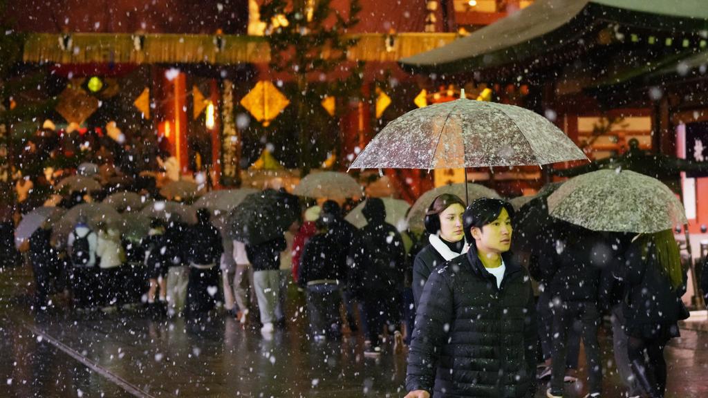 東京落雪。(美聯社)