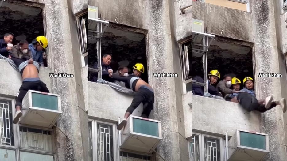 屯門景峰花園一個火警後進行維修的單位發生驚險事故。（網上影片截圖）