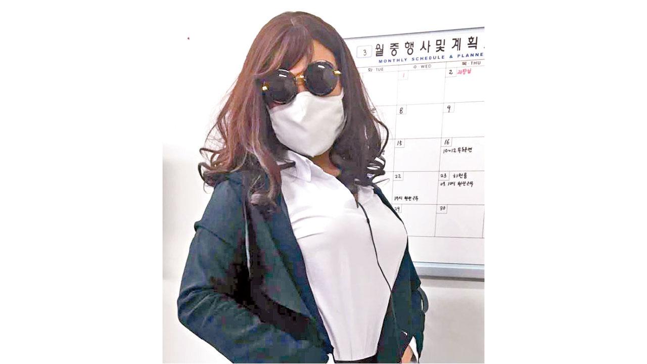 搏擊猛將變身 誘疑犯交易 男扮女韓警屢破毒案