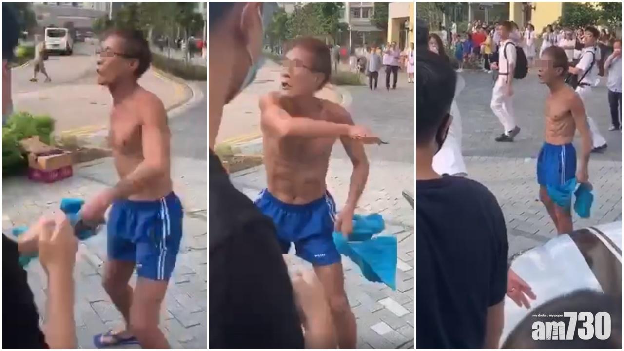 【修例風波】赤膊男九龍城文理書院外揮鎅刀