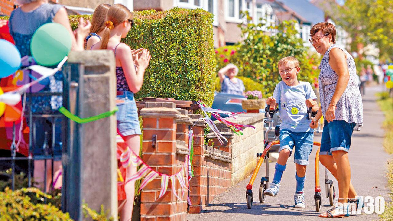 為學校醫院籌得57萬 腦麻痺9歲童完成「全馬」