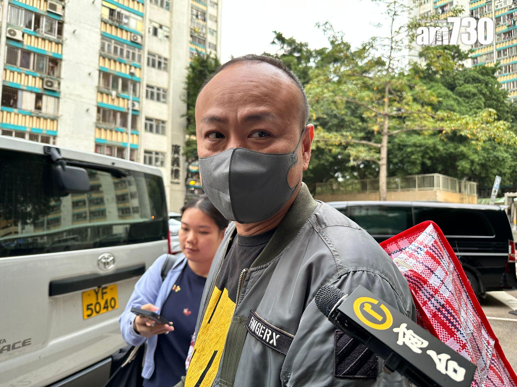 宏志閣居民霍先生目前暫居酒店，他表示是次回來主要拿回「衫褲鞋襪」。(陳穎琳攝)